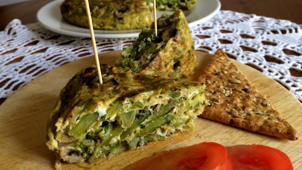 Tortilla de Tagarninas y Portobello con Ajetes