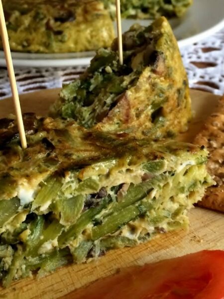 Tortilla de Tagarninas y Portobello con Ajetes